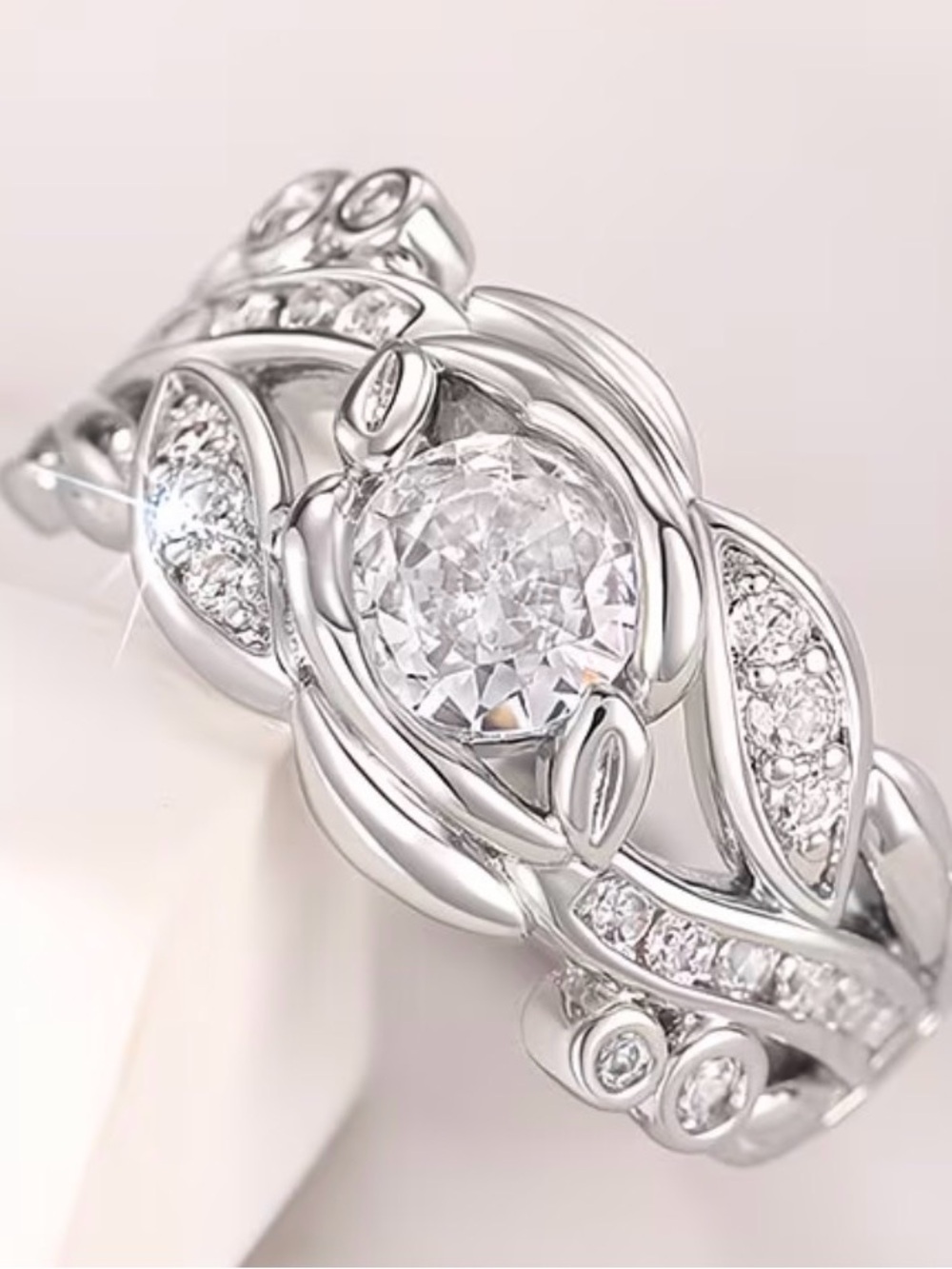 Elegant Twisted Silver Ring with White Stone